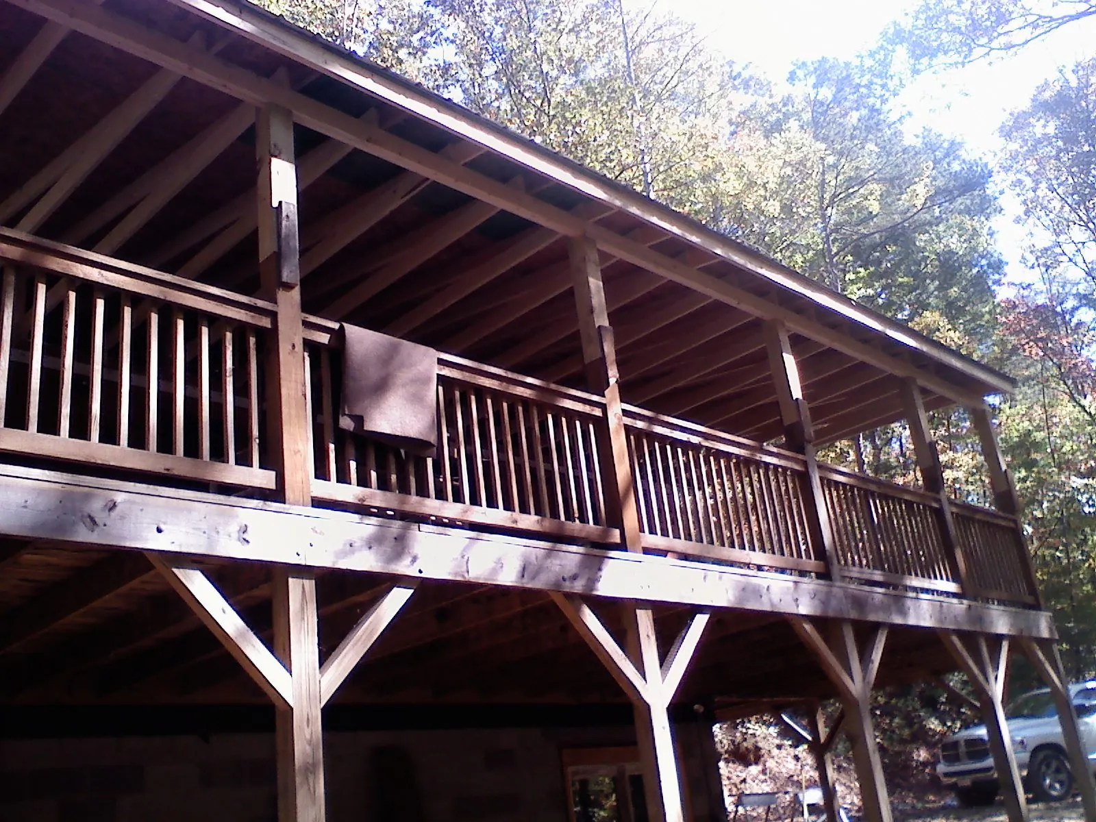 Timber framing under a new elevated porch and deck — Roof Leak Repair in West Lafayette by Roofing Brothers